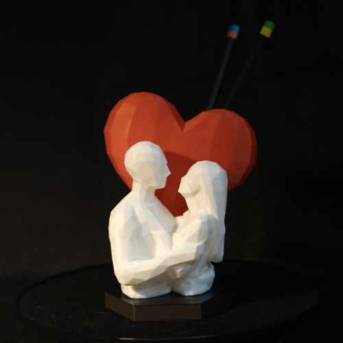 Celebrate love with the Protomont 3D Printed Loving Couple Pen Stand, a beautiful fusion of art and functionality.