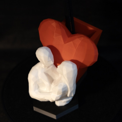 Celebrate love with the Protomont 3D Printed Loving Couple Pen Stand, a beautiful fusion of art and functionality.