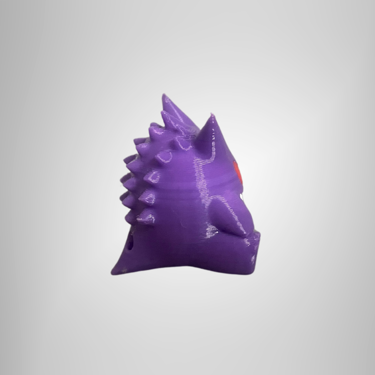 okémon fandom to life with the Protomont 3D Printed Pokémon Gengar Keychain! This charming mini keychain is perfect for Pokémon enthusiasts and collectors