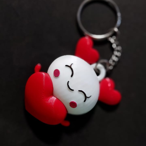 Protomont 3D Printed Cute Love Angel Keychain  Add a touch of charm and affection with the Protomont 3D Printed Cute Love Angel Keychain, a beautifully crafted mini keychain